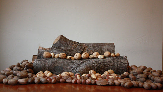A rustic table with mixed nuts for a simple snack backup.