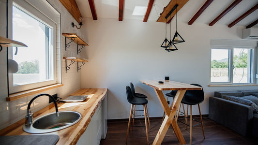 Bright kitchen with a clear wooden counter and open shelves
