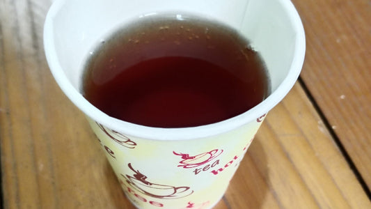 A warm cup on a wooden table for a simple evening routine.