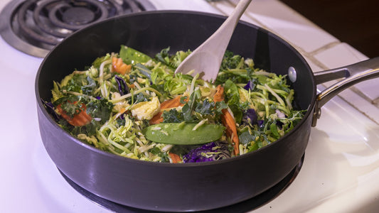 Colorful mixed vegetables cooking in a pan