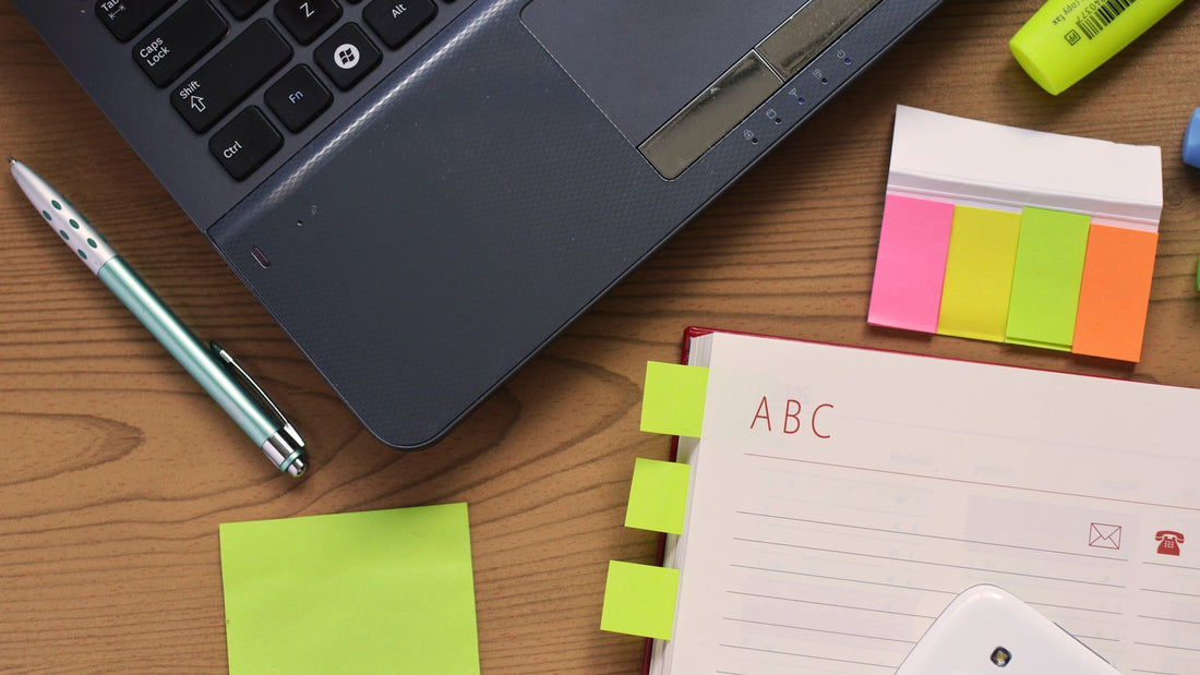 Open notebook and pen on a tidy desk
