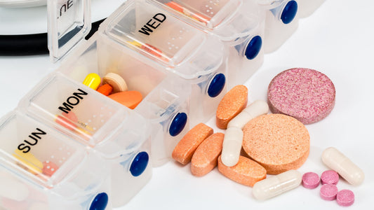 Weekly supplement organizer with assorted capsules and tablets